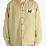 Tan jacket worn by a person, showing the jacket's fit