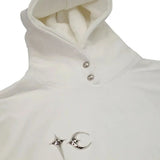 Close up of white hoodies, showing texture of the cotton fabric