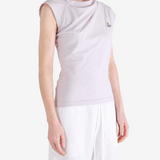 Purple top worn by a person, showing the top fit