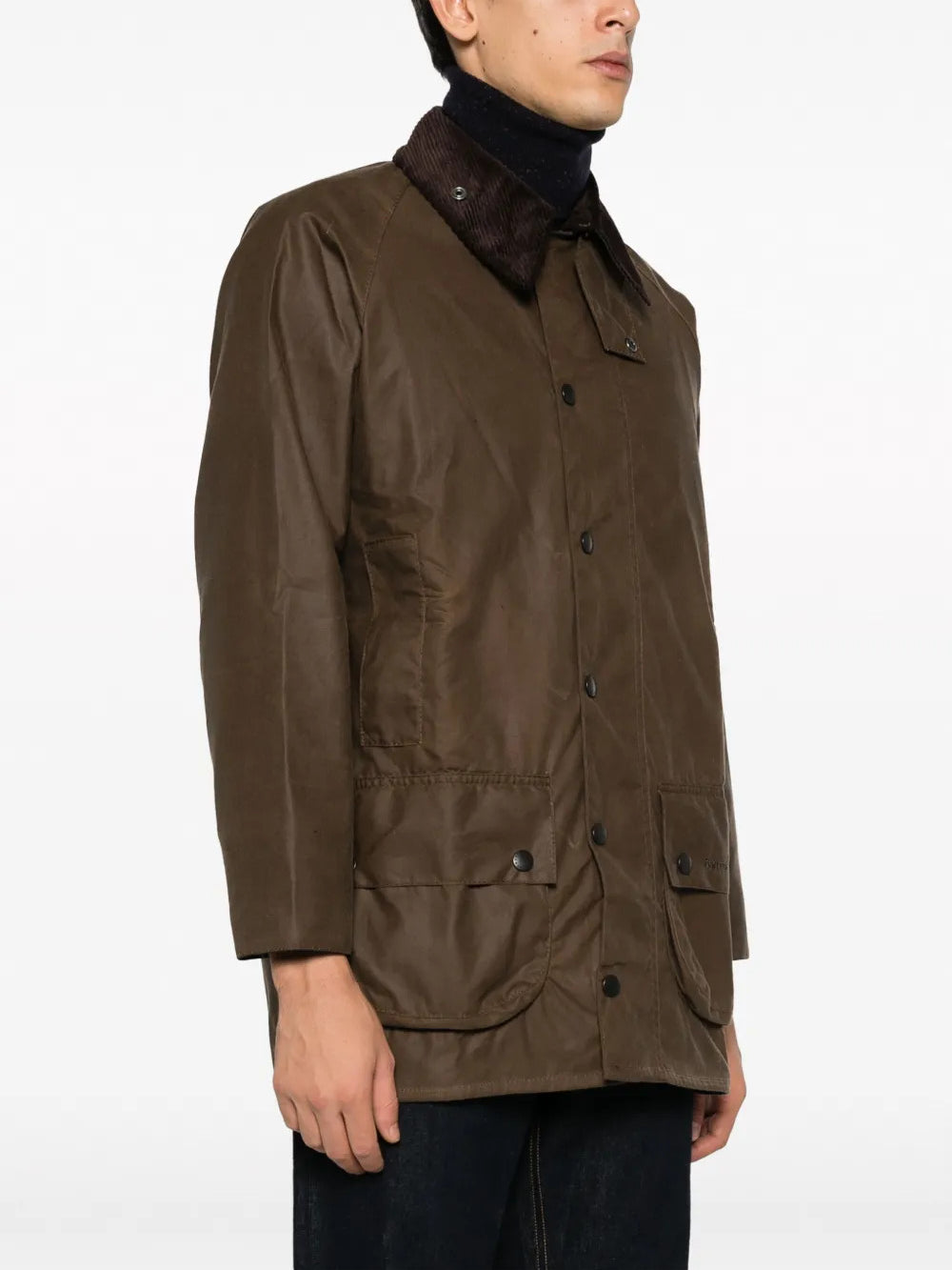 Brown jacket worn by a person, showing the jacket fit