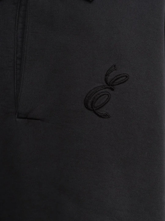 Close up of black sweater,showing texture of the cotton fabric