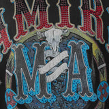 Close up of Black t-shirt, showing texture of the 100% cotton fabric