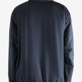 Navy jacket worn by a person, showing the jacket's fit