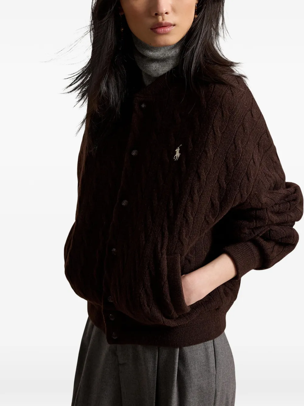 Brown jacket worn by a person, showing the jacket fit