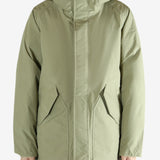 Green jacket worn by a person, showing the jacket's fit