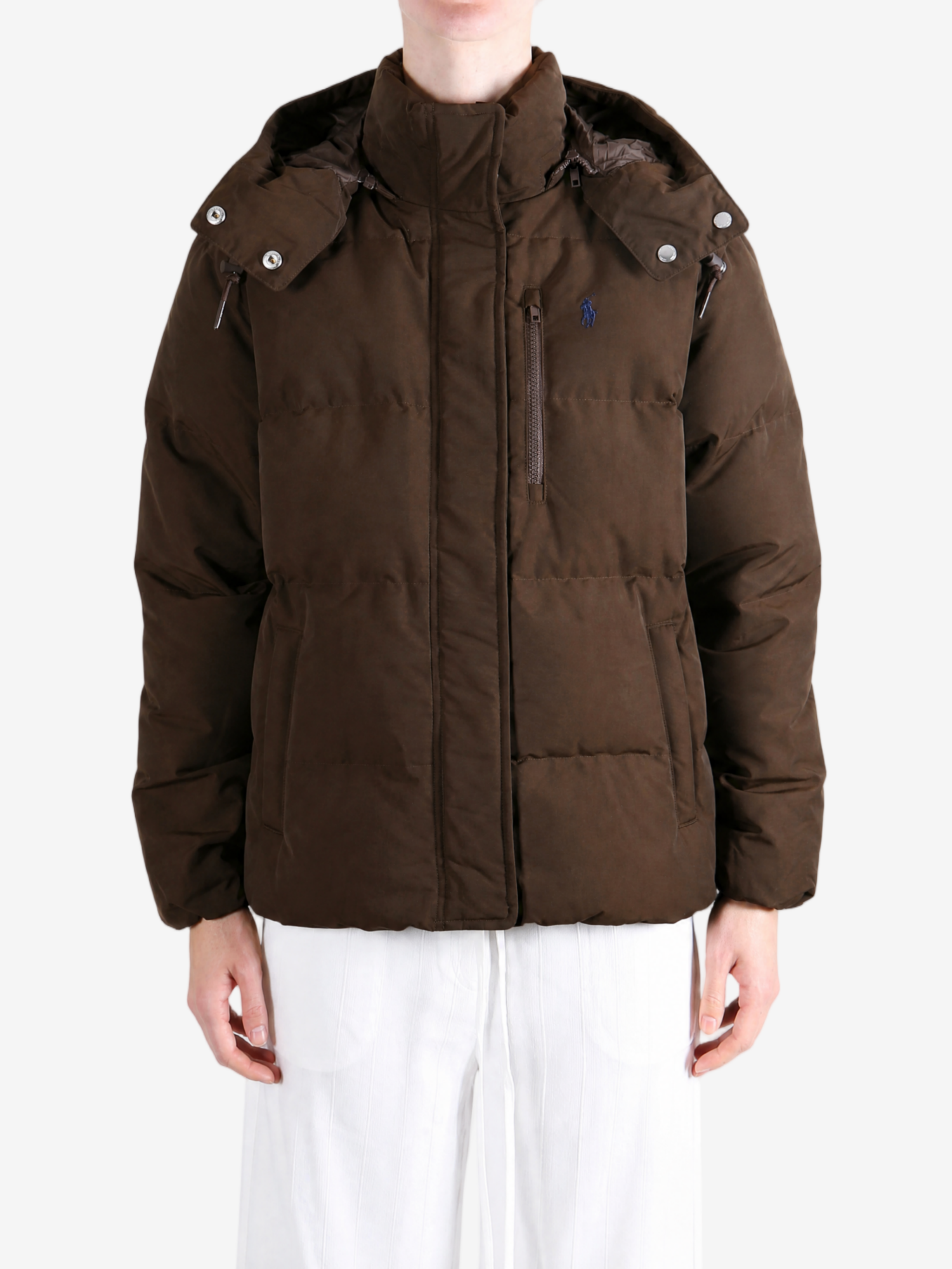Brown jacket worn by a person, showing the jacket fit