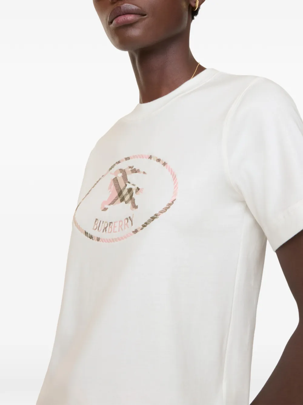 Whirt t-shirt worn by a person, showing the t-shirt  fit