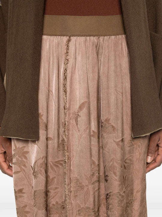 Brown skirt worn by a person, showing the skirt fit