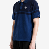 Navy shirt worn by a person, showing the shirt fit