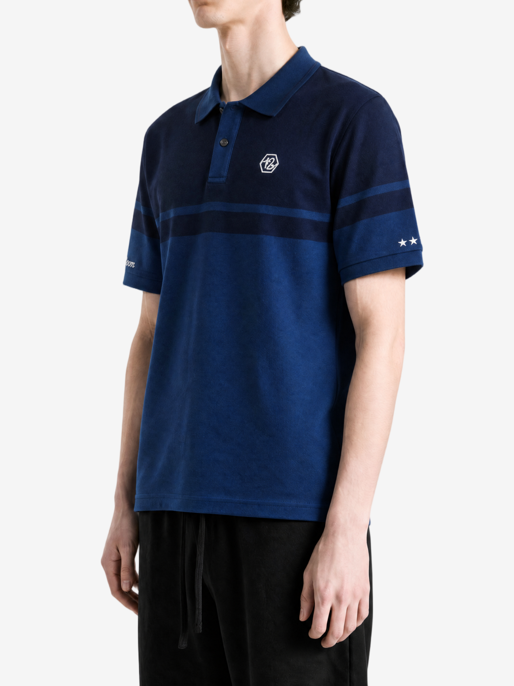 Navy shirt worn by a person, showing the shirt fit