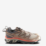 Tan sneakers, side view