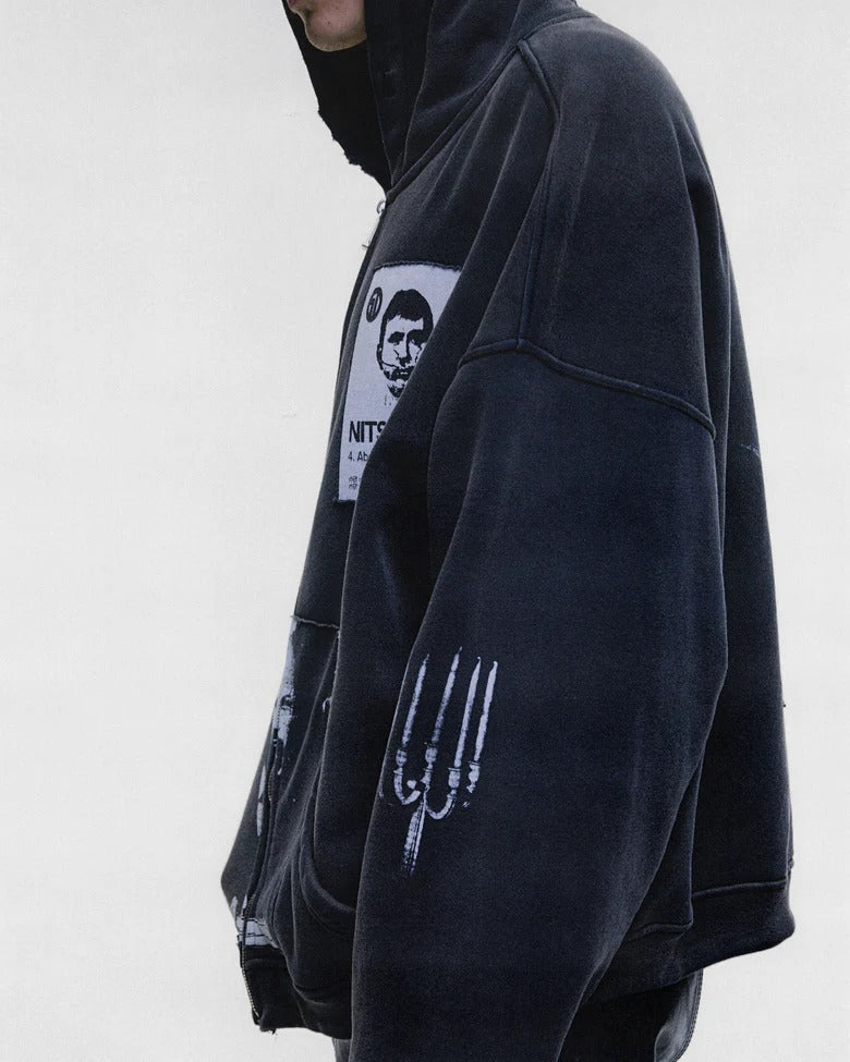 Black hoodie worn by a person, showing the hoodie fit