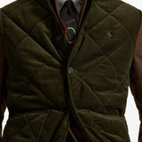 Green jacket worn by a person, showing the jacket fit