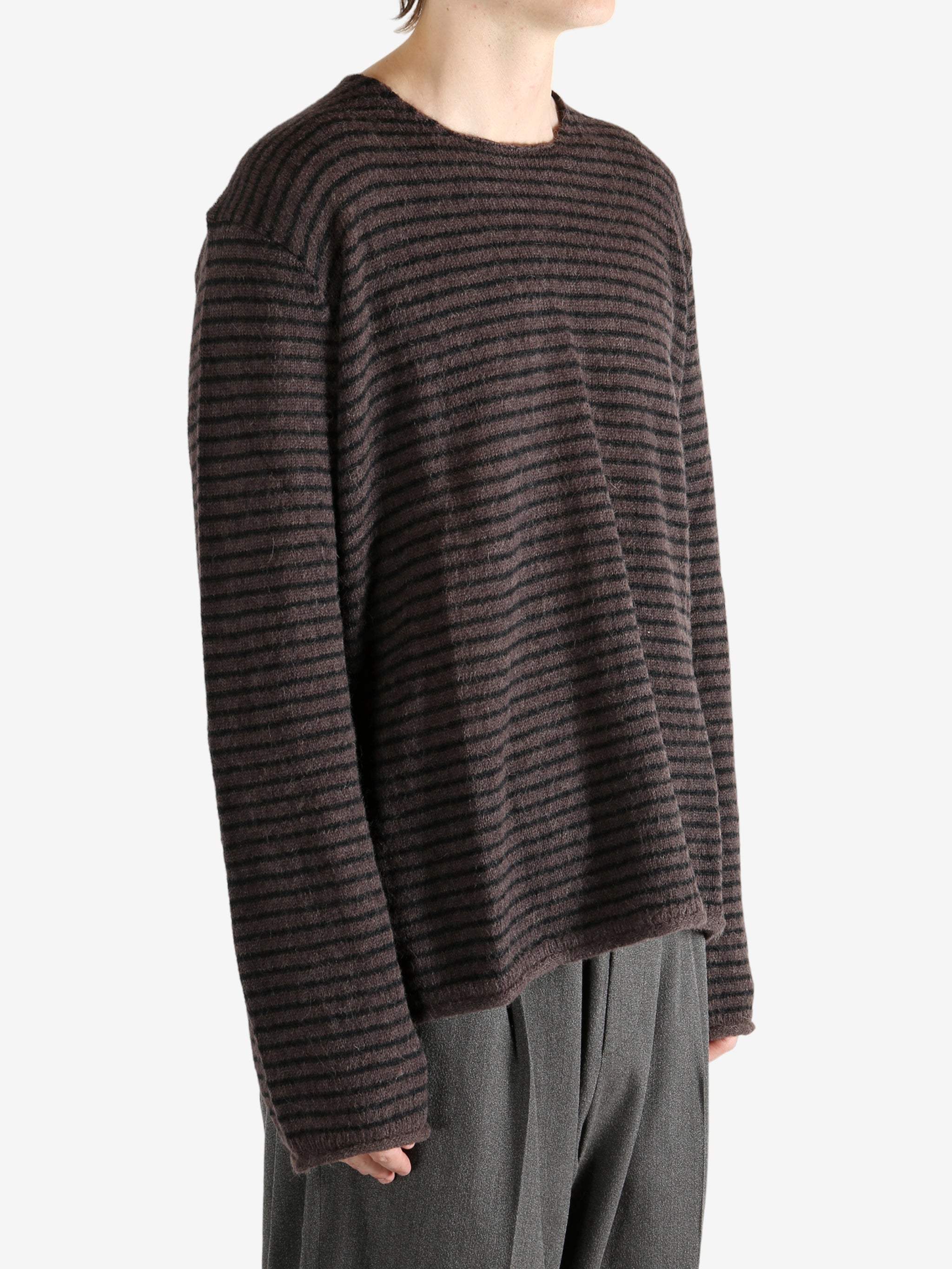 Brown shirt worn by a person, showing the shirt's fit