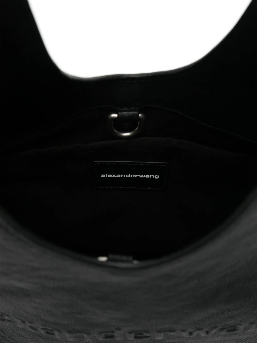Close up of black bag,showing texture of the leather fabric.