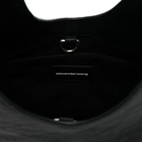 Close up of black bag,showing texture of the leather fabric.