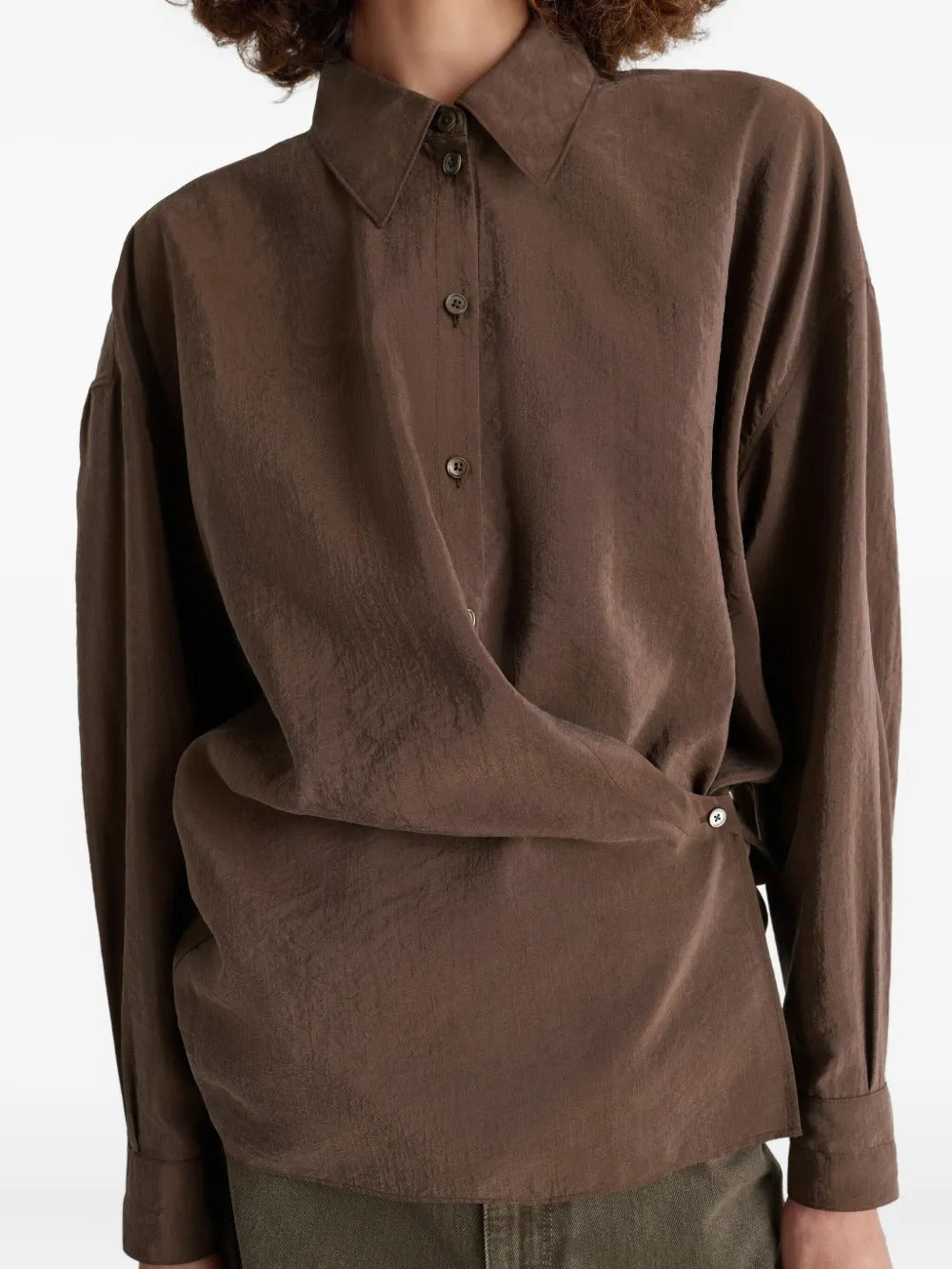 Brown shirt worn by a person, showing the shirt's fit