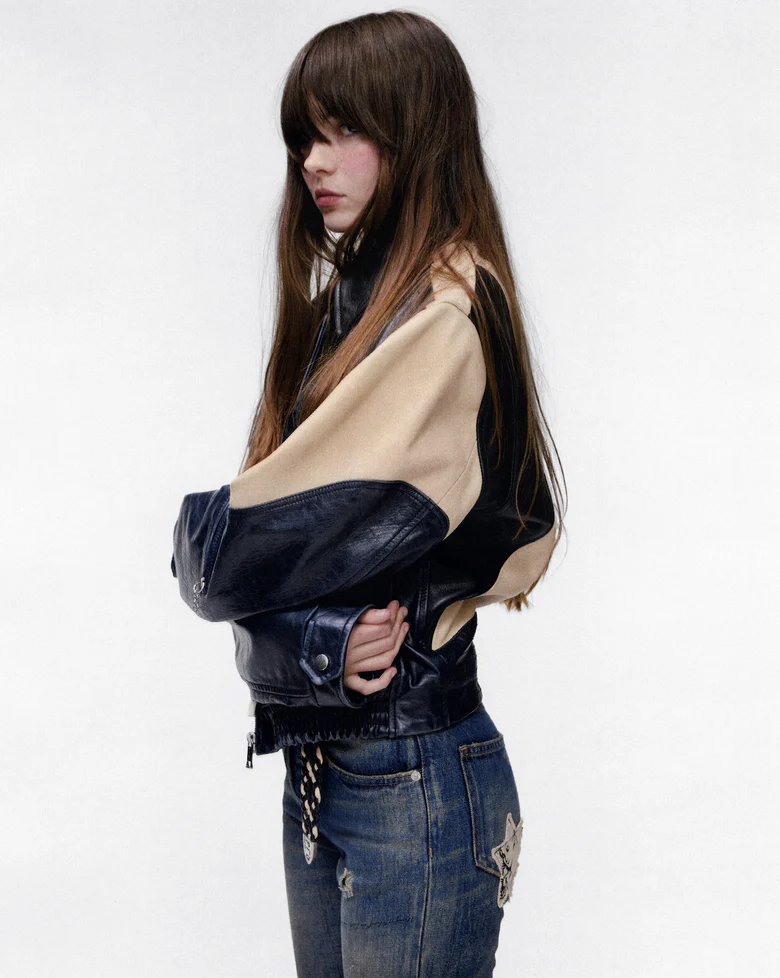Navy jacket worn by a person, showing the jacket fit