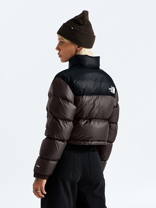 Brown jacket worn by a person, showing the jacket fit