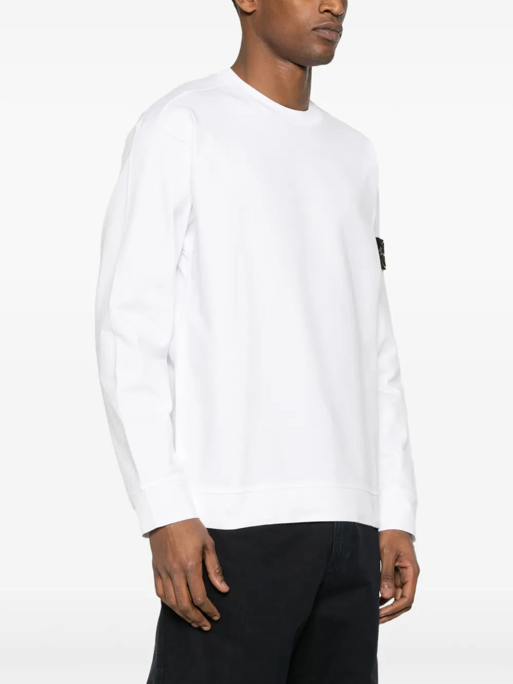 Black hoodie worn by a person, showing the hoodie fit