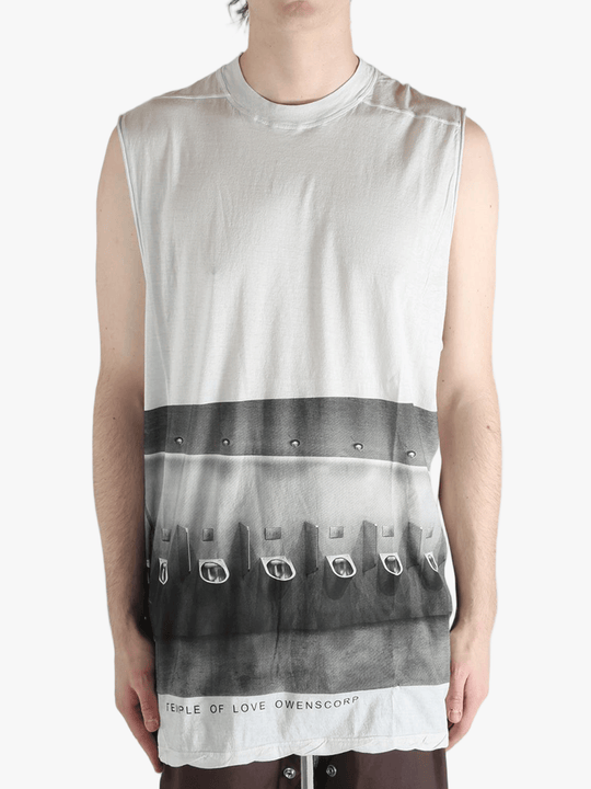 White top worn by a person, showing the top's fit