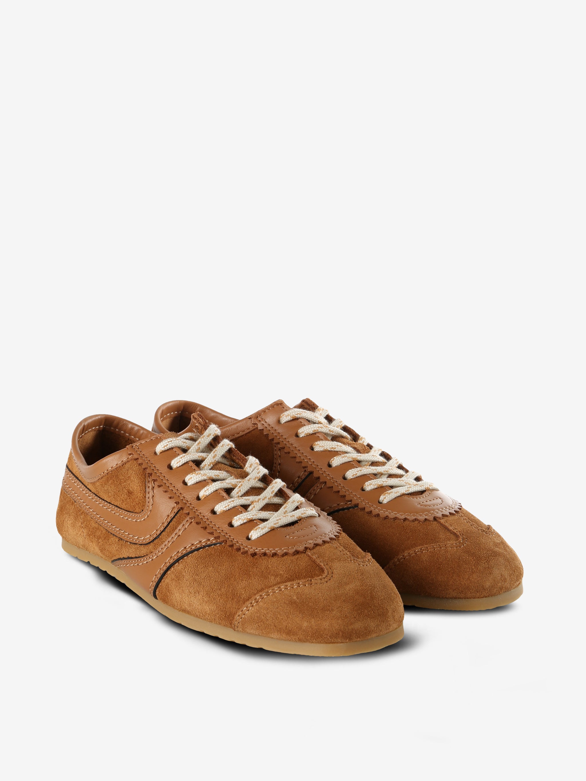 Tan sneakers, side view