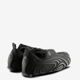 Black sneaker, back view