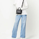 Black accessories, full body view