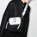 White bags worn by a person