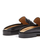 Close up of black shoes,showing texture of the leather fabric.