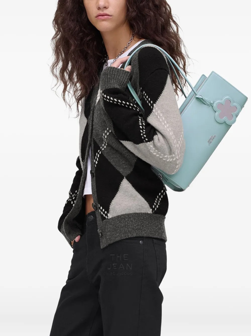 Blue bag worn by a person, showing the bag's fit