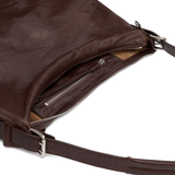 Close up of the brown bag, showing texture of the leather fabric