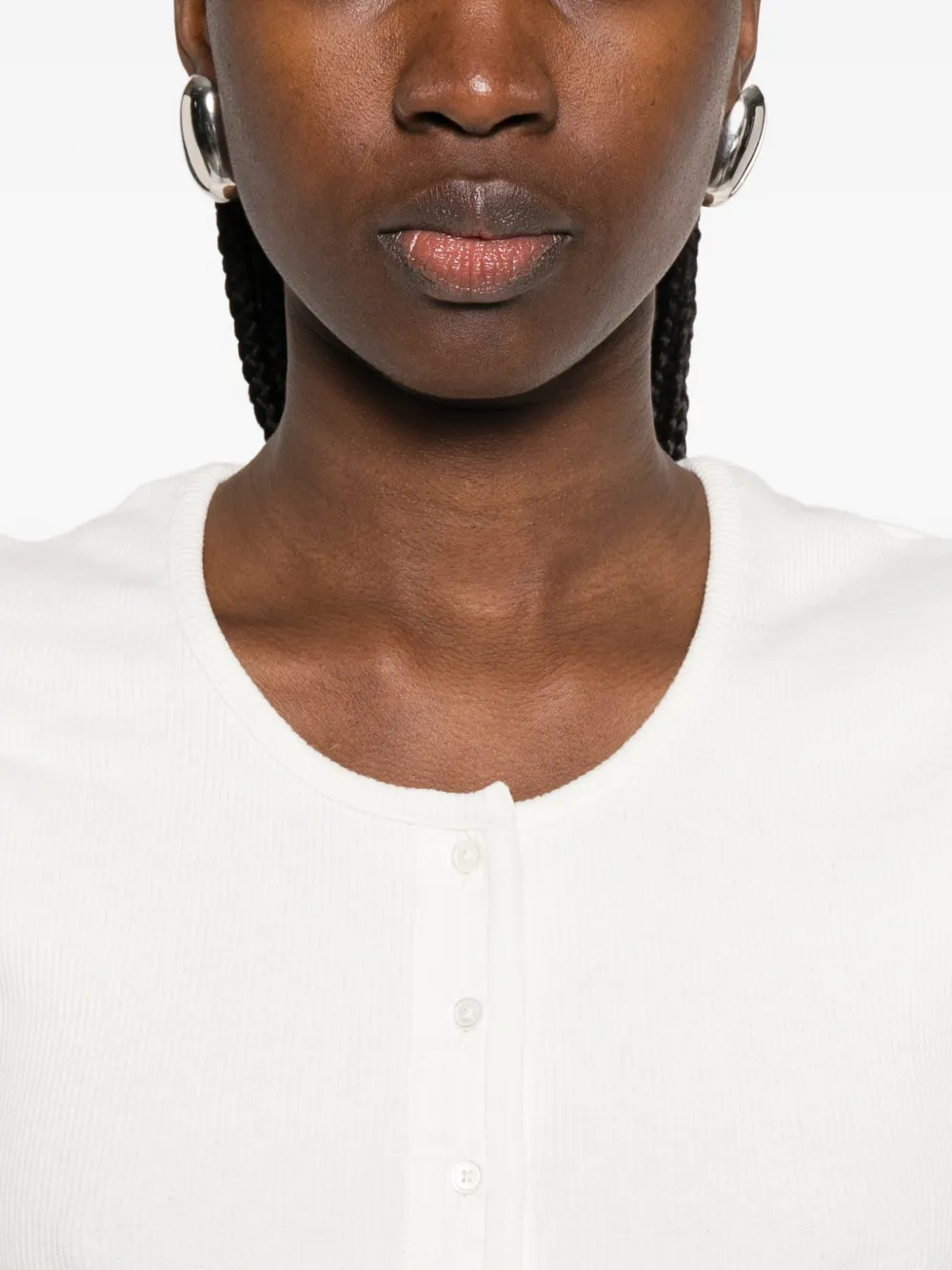 Close up of white shirt, showing texture of the cotton fabric