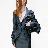 Black bag worn by a person, showing the bags fit