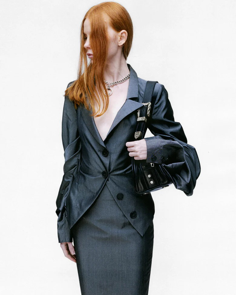 Black bag worn by a person, showing the bags fit