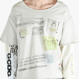 White shirt worn by a person, showing the shirt's fit