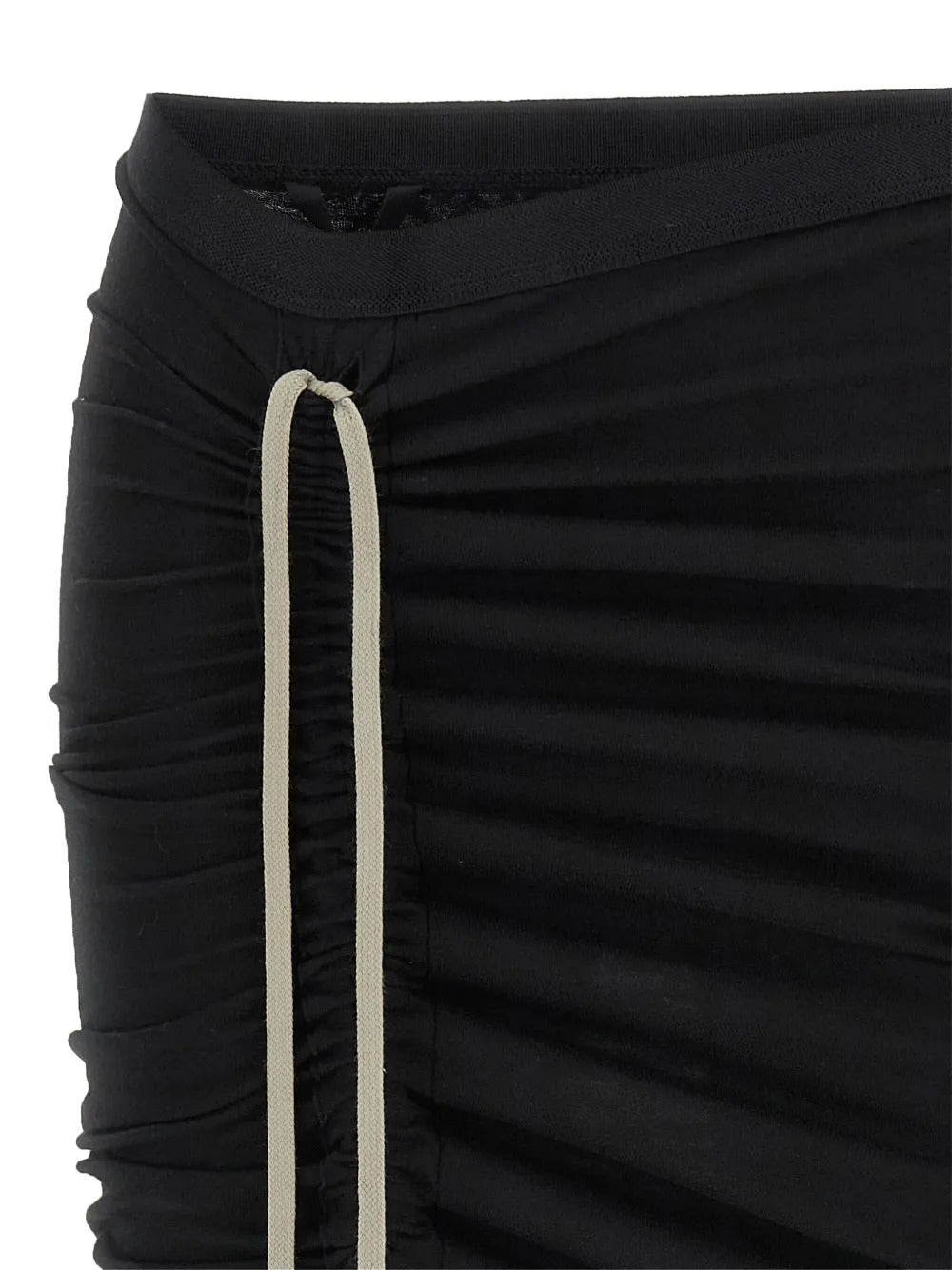 Close up of black skirt, showing texture of the cotton fabric