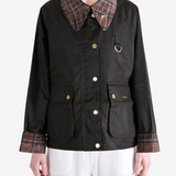 Black jacket worn by a person, showing the jacket fit