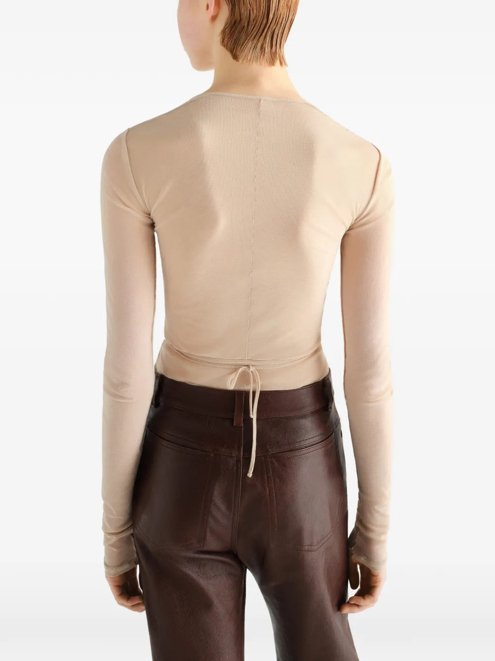 Tan top worn by a person, showing the top fit