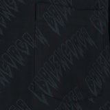 Cloes-up of black shirts, showing the logo fabric