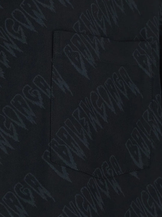 Cloes-up of black shirts, showing the logo fabric