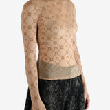 Tan top worn by a person, showing the top fit