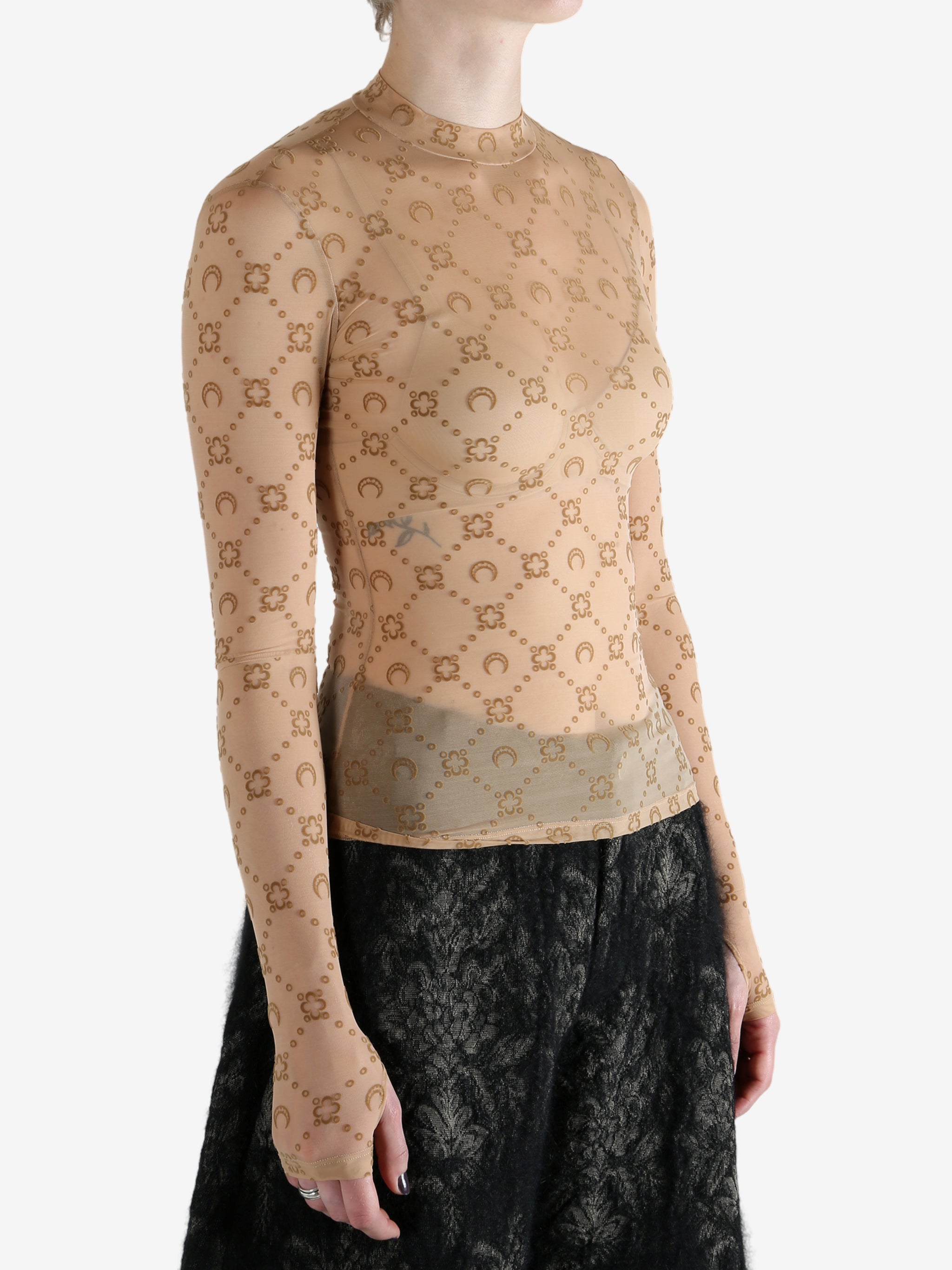 Tan top worn by a person, showing the top fit