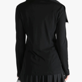 Black jackets worn by a person, showing the jackets fit