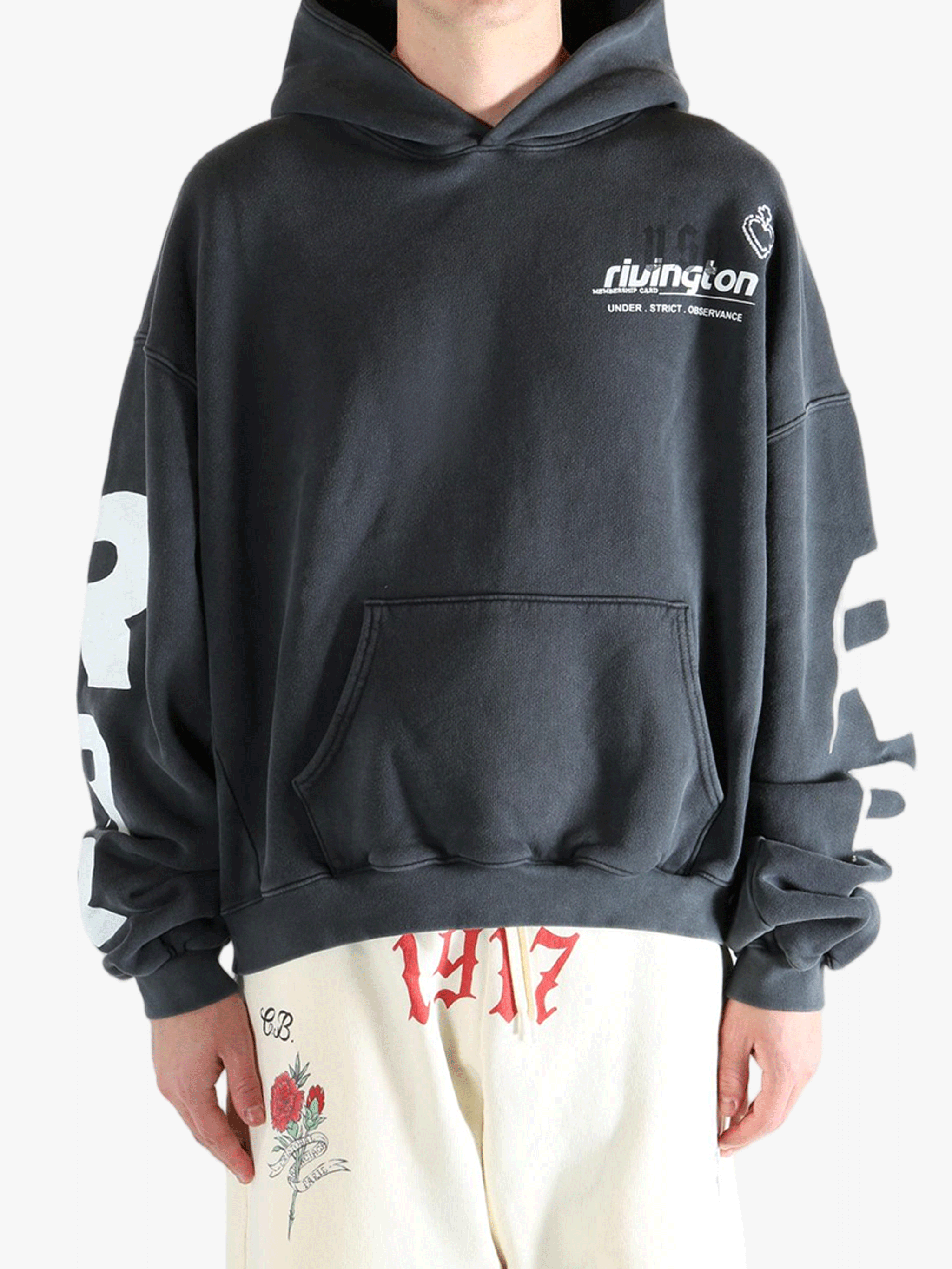 Black hoodie worn by a person, showing the hoodie fit