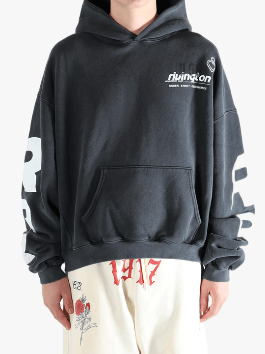 Black hoodie worn by a person, showing the hoodie fit