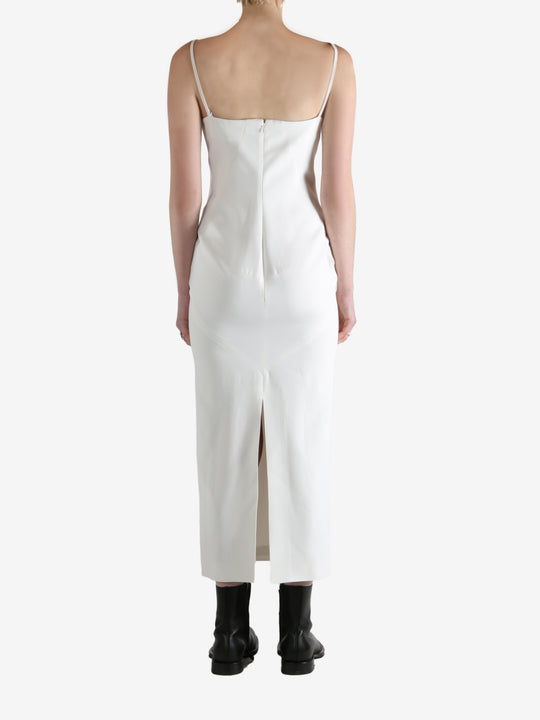 White dresses worn by a person, showing the dresses fit