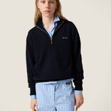 Brown sweater  worn by a person, showing the sweater 's fit