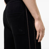 Black shorts worn by a person, showing the shorts fit