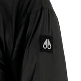 Close up of Black jacket, showing texture of the 100% polyester fabric